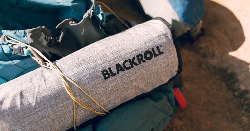 Close-up of hiking equipment featuring a Blackroll accessory, perfect for outdoor adventures.