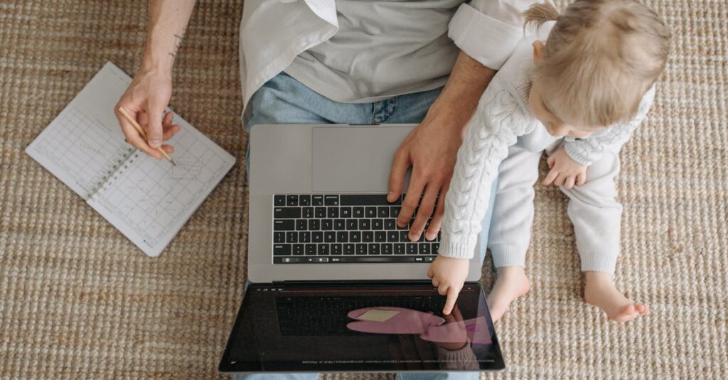 Father and child bonding over a laptop, enjoying togetherness and learning.